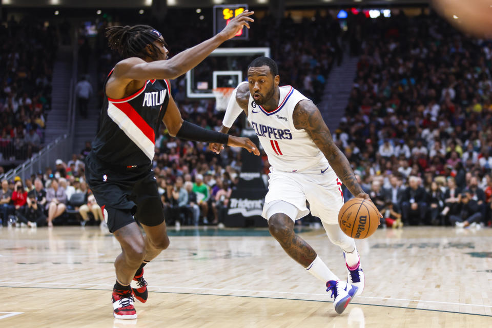 洛杉磯快艇補進John Wall（持球者）。（Joe Nicholson-USA TODAY Sports）