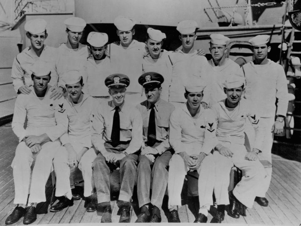 Jimmy Carter poses with sailors aboard U.S.S. Wyoming in 1947