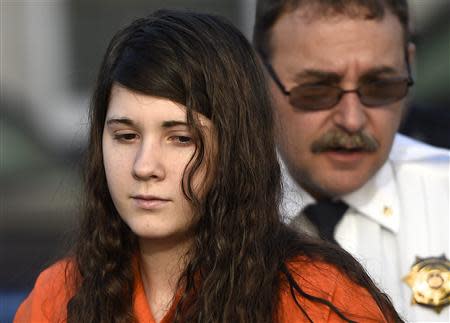Miranda Barbour, 19, the woman dubbed the so-called Craigslist killer suspect, is led into court by sheriff deputies in Sunbury, Pennsylvania April 1, 2014. REUTERS/Mark Makela