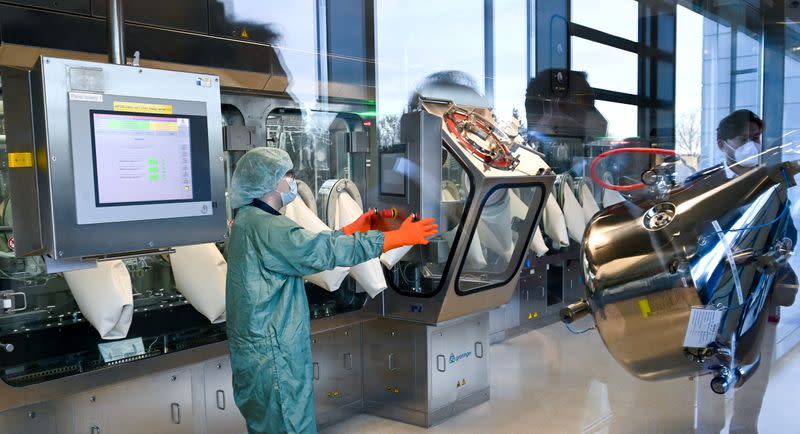 FILE PHOTO: Staff works at the vaccine maker IDT Biologika production in Dessau Rosslau