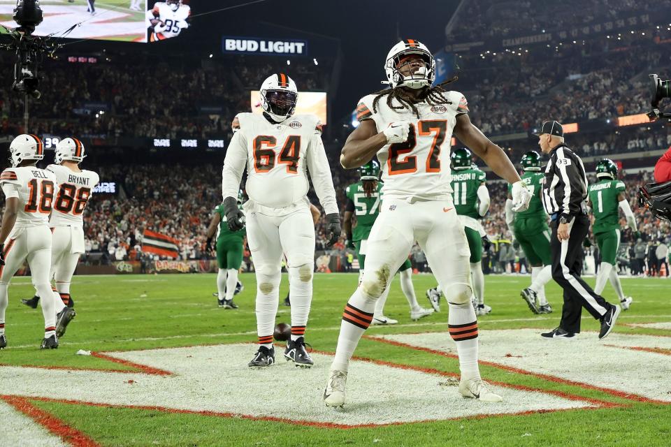 Cleveland Browns running back Kareem Hunt (27) celebrates after scoring a touchdown against the New York Jets on Dec. 28, 2023, in Cleveland.