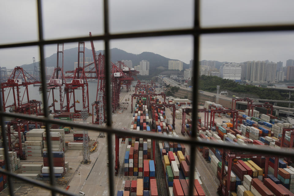 Shipping containers are seen at the port of Kwai Tsing Container Terminals in Hong Kong, Friday, May 24, 2019. Kwai Tsing Container Terminals is one of the busiest ports in the world. (AP Photo/Kin Cheung)