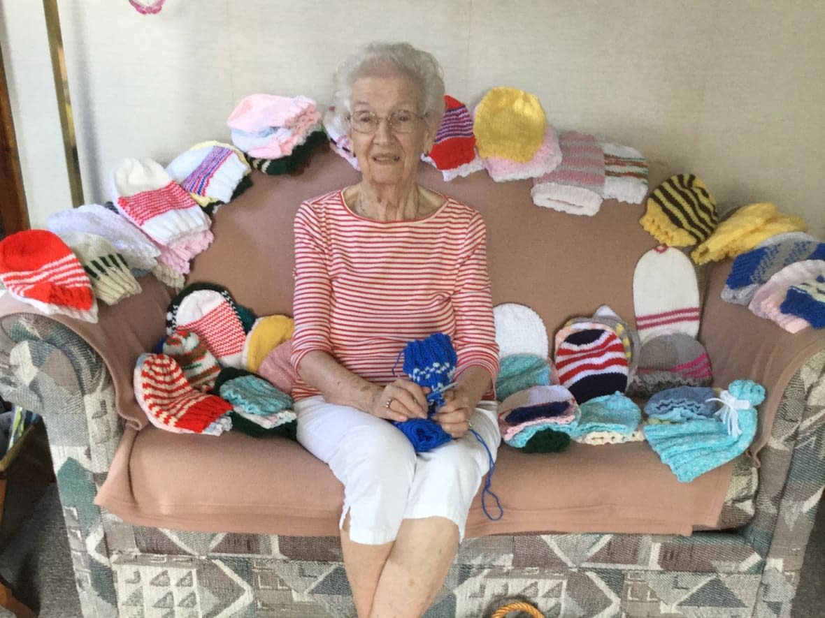 Etta Jamieson of Truro, N.S., turned 100 years old last Thursday. She celebrated with cake, and by reaching her goal of knitting 100 caps for babies during the last year. (Submitted by Bonnie Sutherland - image credit)