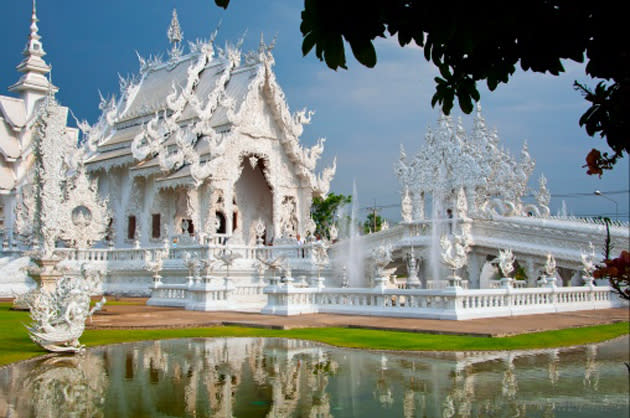 <b><p>Wat Rong Khun Temple (Chiang Mai, Thailand)</p></b> <p>The temple’s architecture is said to be inspired by heaven and the snow white exterior represents the purity of Buddha.</p>