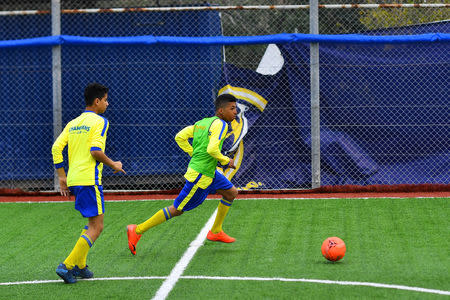 Moatasem Al-Nabeeh, 14, who is diagnosed with cancer, plays soccer with fellow cancer patients in Gaza City, February 15, 2019. REUTERS/Dylan Martinez