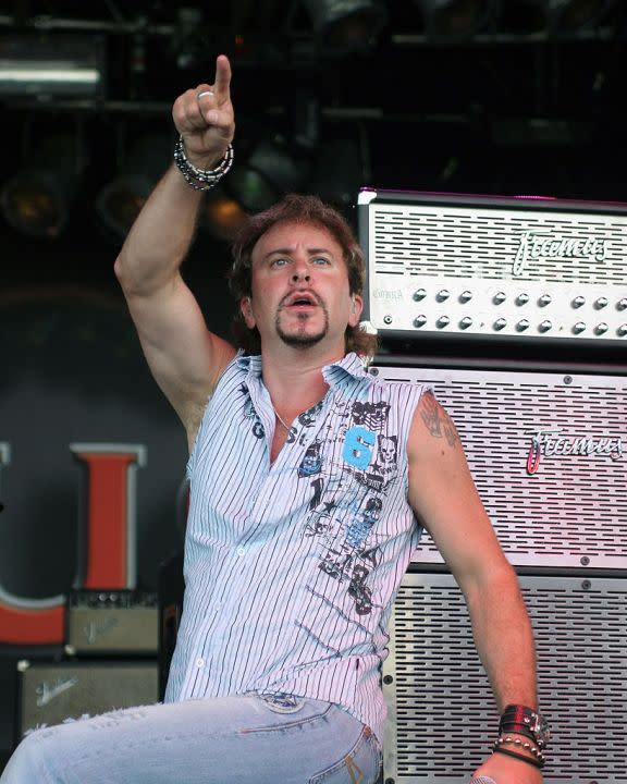 POMPANO, FL – JULY 7: Vocalist CJ Snare of Firehouse performs during the “Rock Never Stops” Tour at the Pompano Beach Amphitheater on July 7, 2005 in Pompano, Florida. (Photo by Ralph Notaro/Getty Images)