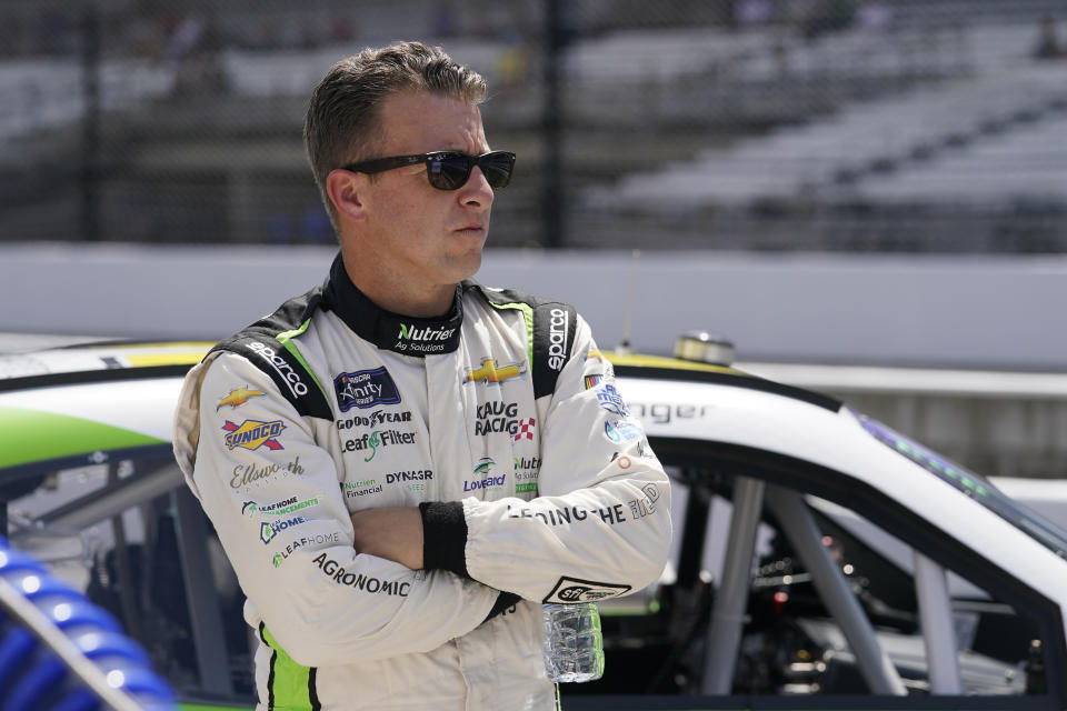 AJ Allmendinger looks on during qualifications for a NASCAR Xfinity Series auto race at Indianapolis Motor Speedway, Friday, July 29, 2022, in Indianapolis. (AP Photo/Darron Cummings)