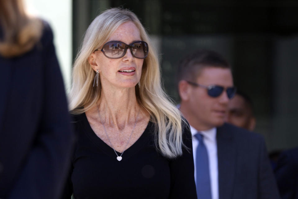 Beth Holloway walks out to speak to reporters after Joran van der Sloot's plea and sentencing hearing in the Hugo L. Black Federal Courthouse, Oct. 18, 2023, in Birmingham, Ala. / Credit: AP Photo/ Butch Dill