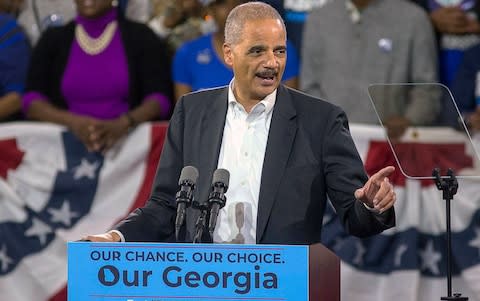 Eric Holder  - Credit: Alyssa Pointer/Atlanta Journal-Constitution via AP