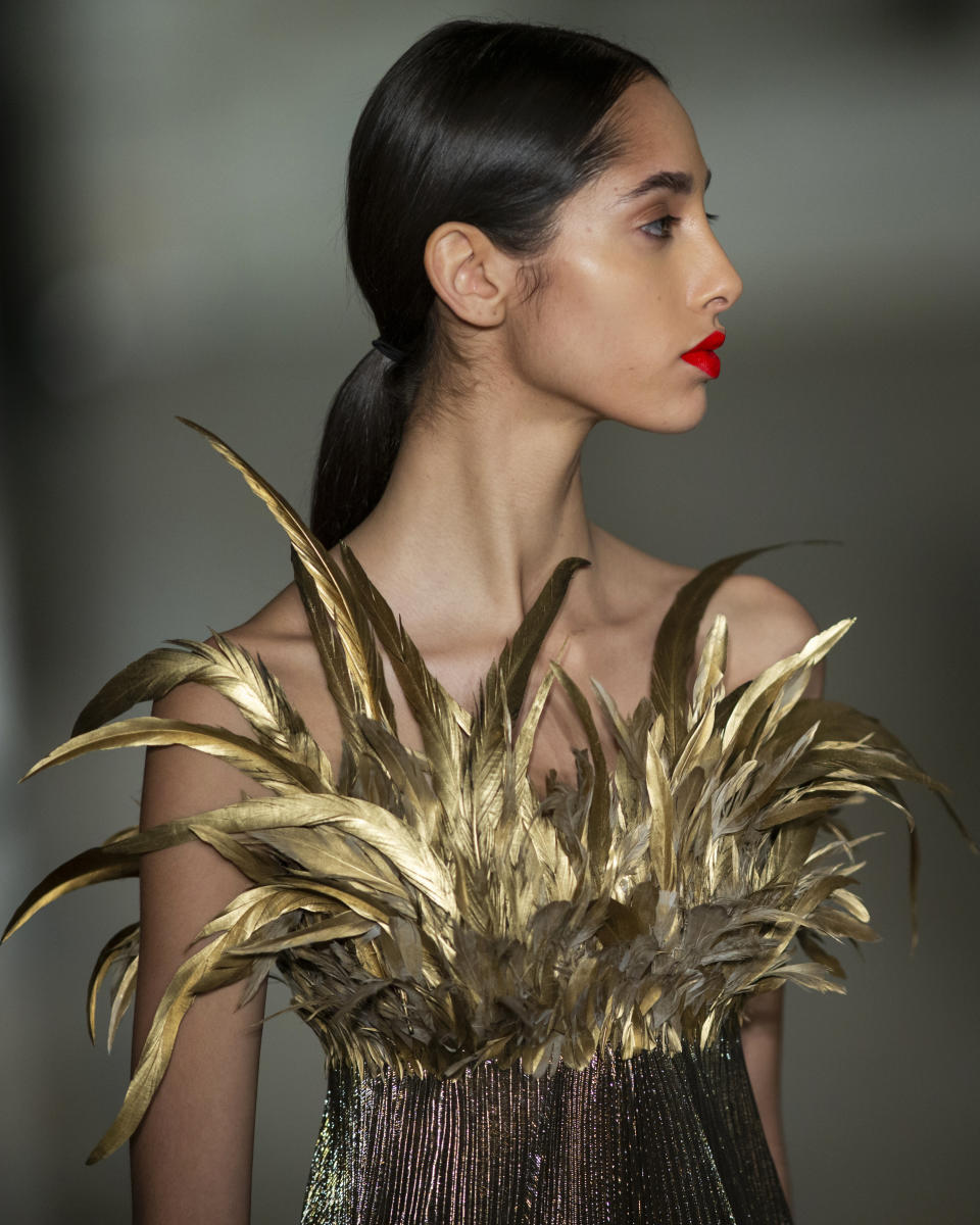 The Oscar De la Renta collection is modeled during Fashion Week, Monday, Feb. 10, 2020, in New York. (AP Photo/Eduardo Munoz Alvarez)