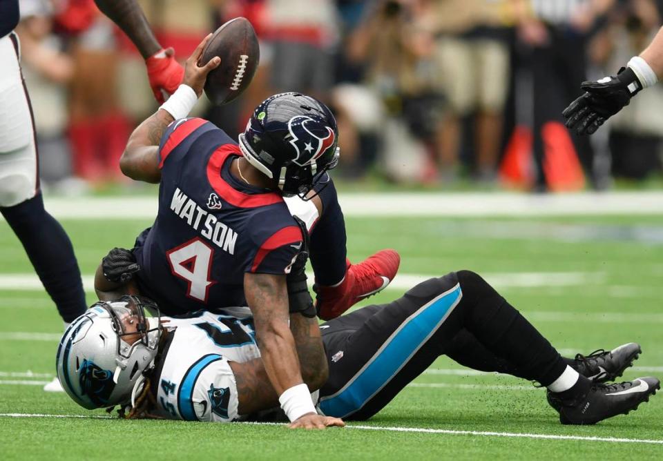 Carolina Panthers outside linebacker Shaq Thompson (54) sacks Houston Texans quarterback Deshaun Watson (4) in the first half at NRG Stadium in Houston, Texas on Sunday, September 29, 2019.