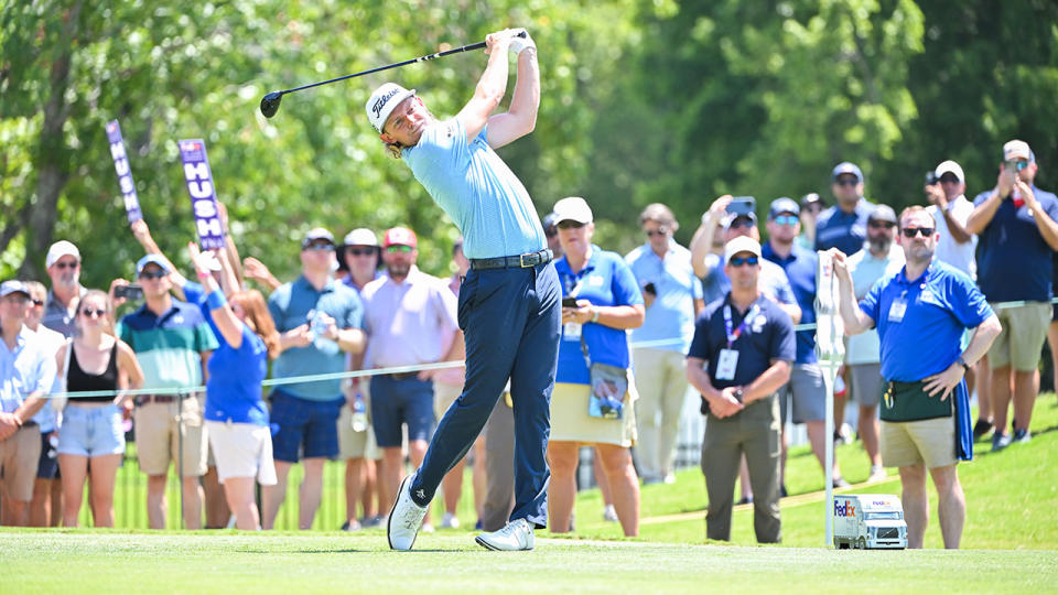 Cam Smith is pictured hitting a tee shot at the St Jude Championship.