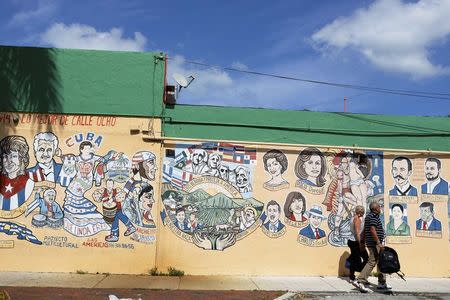 Cuban-themed murals adorn the buildings along SW 8th Street, known locally as "Calle Ocho" in the Little Havana neighborhood of Miami, Florida May 17, 2014. REUTERS/Brian Blanco