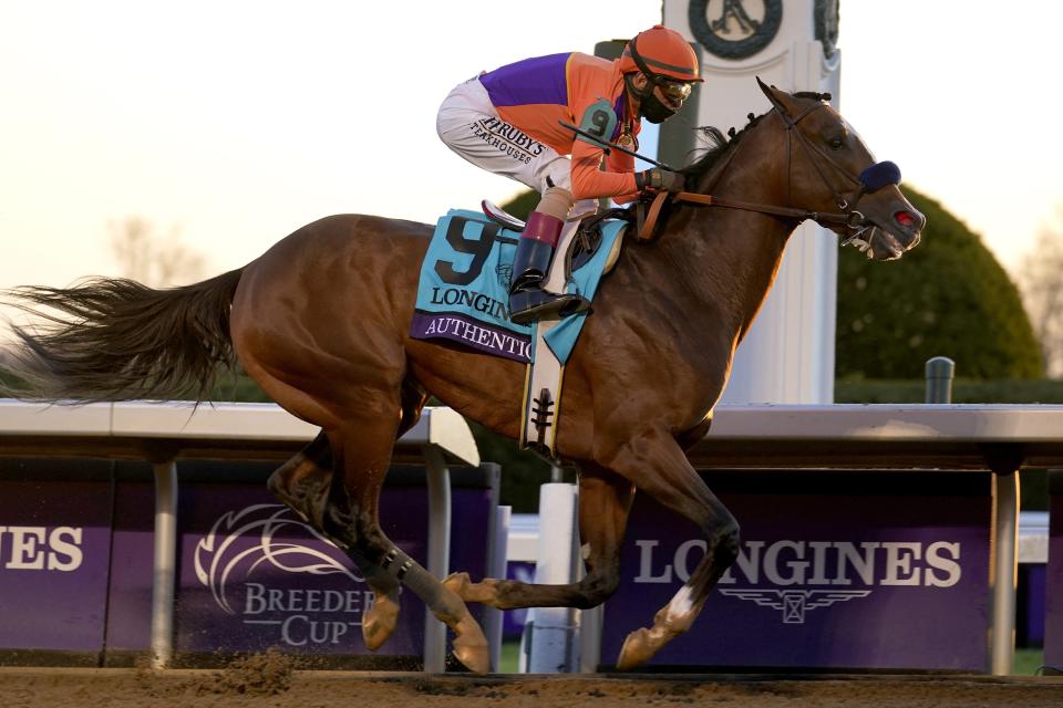 John Velazquez (9) rides Authentic to win the Breeder's Cup Classic horse race at Keeneland Race Course, in Lexington, Ky., Saturday, Nov. 7, 2020. (AP Photo/Michael Conroy)