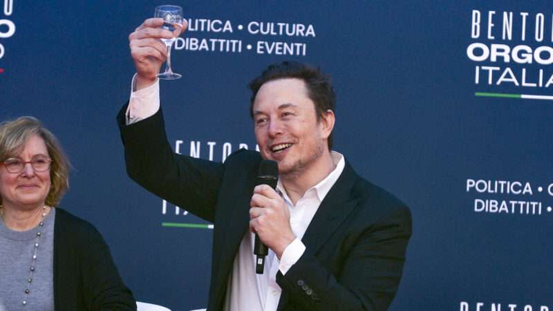 Elon Musk raises a glass
