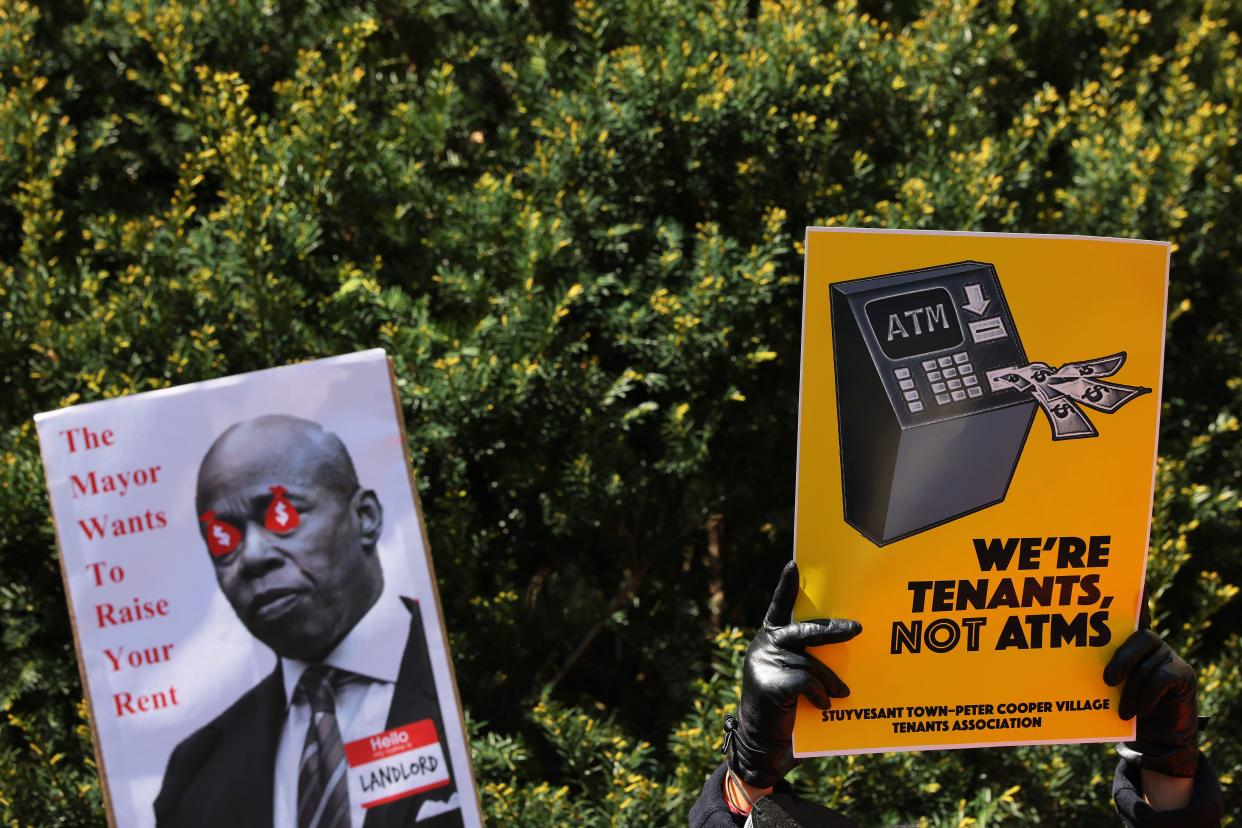 People gather for a rally protesting rent hikes at City Hall Park on April 28, 2022. 