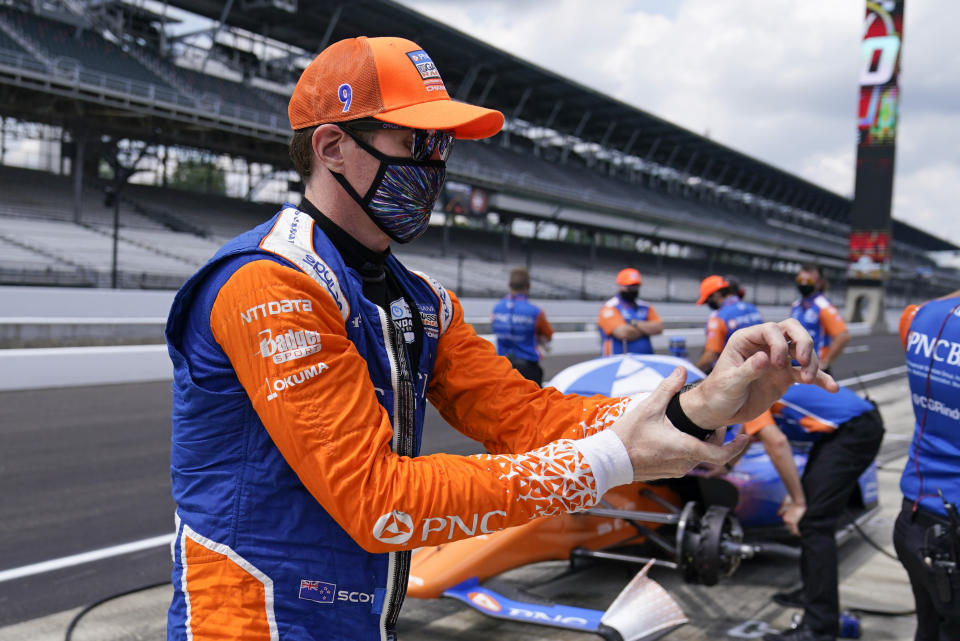 Scott Dixon, of New Zealand, prepares to drive during a practice session for the Indianapolis 500 auto race at Indianapolis Motor Speedway, Wednesday, Aug. 12, 2020, in Indianapolis. (AP Photo/Darron Cummings)