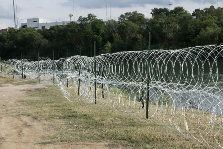 Barbed and concertina wire can be seen installed at a public park in Laredo
