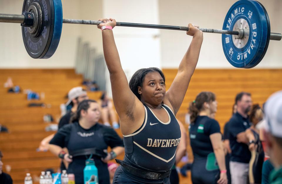 Davenport's Lyric Pittman completes the clean and jerk on Friday at the Class 2A, Region 3 girls weightlifting meet at New Port Richey High School.