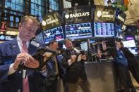 Traders work on the floor of the New York Stock Exchange, November 12, 2013. REUTERS/Brendan McDermid