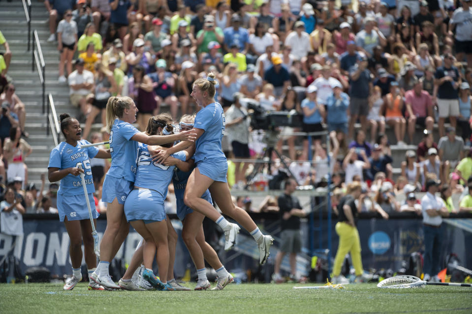North Carolina players celebrate after winning the NCAA college Division 1 women's lacrosse championship against Boston College in Baltimore, Sunday, May 29, 2022. (Vincent Alban/The Baltimore Sun via AP)