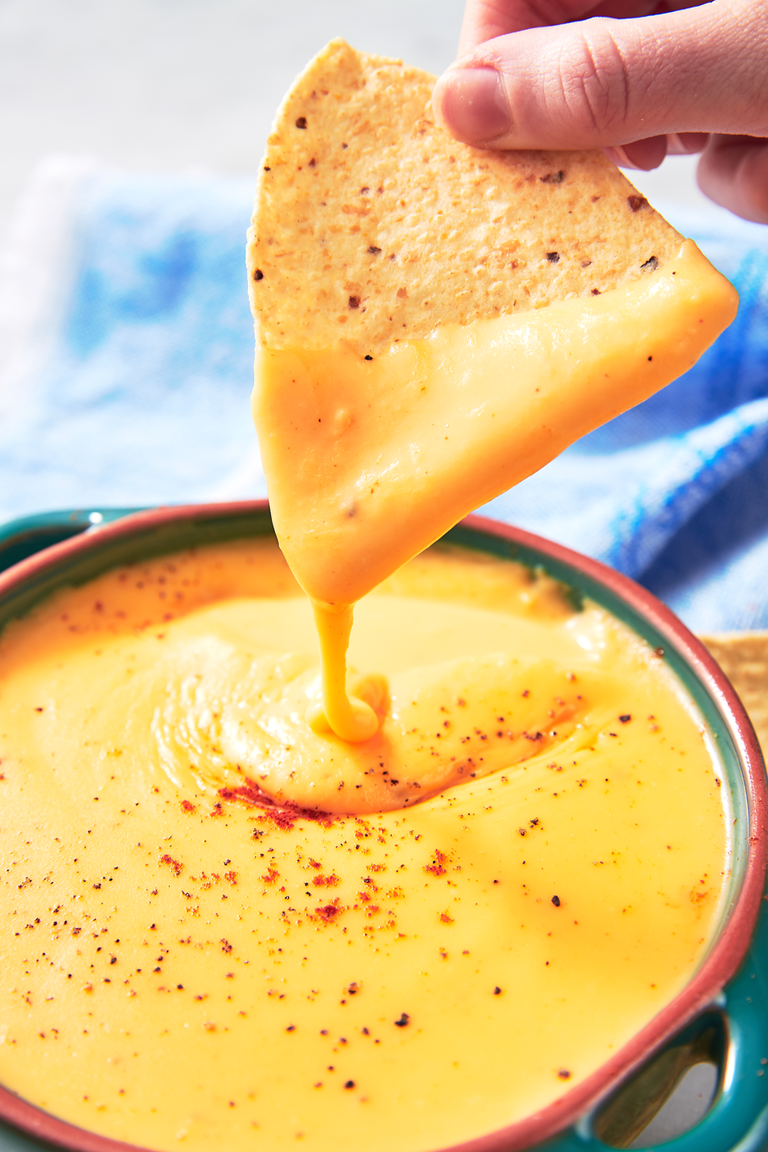 <p>This stuff blows the jarred kind out of the water.</p><p>Get the recipe from <a href="https://www.delish.com/cooking/recipe-ideas/a25862033/nacho-cheese-sauce-recipe/" rel="nofollow noopener" target="_blank" data-ylk="slk:Delish" class="link ">Delish</a>.</p>