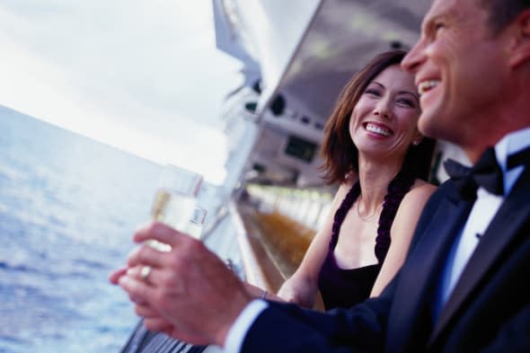 Couple Leaning on a Cruise Ship Railing