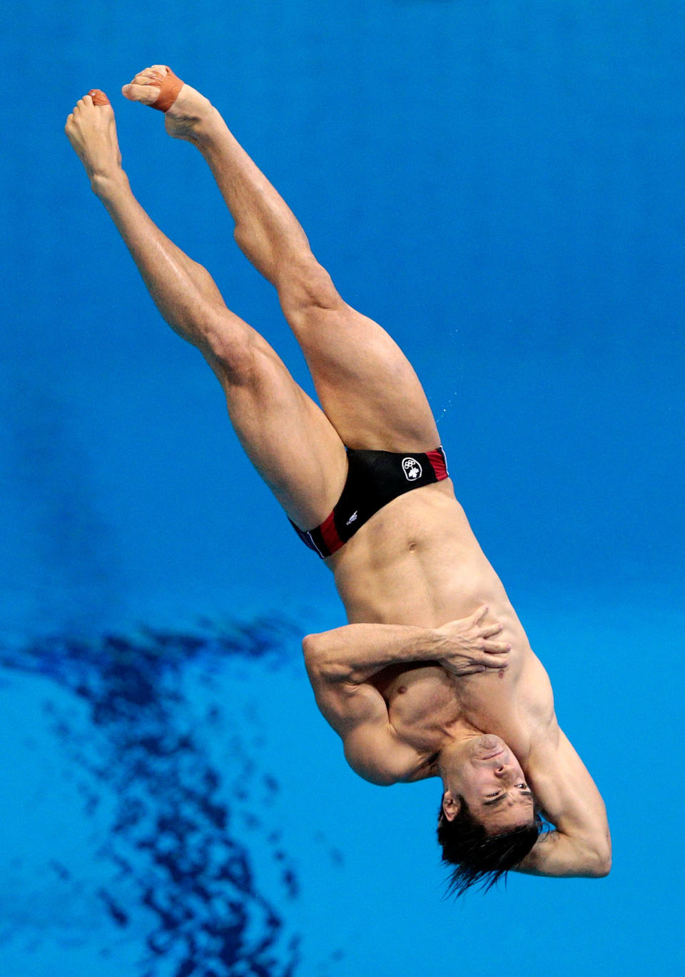 LONDON, ENGLAND - AUGUST 07: Alexandre Despatie of Canada competes in the Men's 3m Springboard Diving Final on Day 11 of the London 2012 Olympic Games at the Aquatics Centre on August 7, 2012 in London, England. (Photo by Adam Pretty/Getty Images)