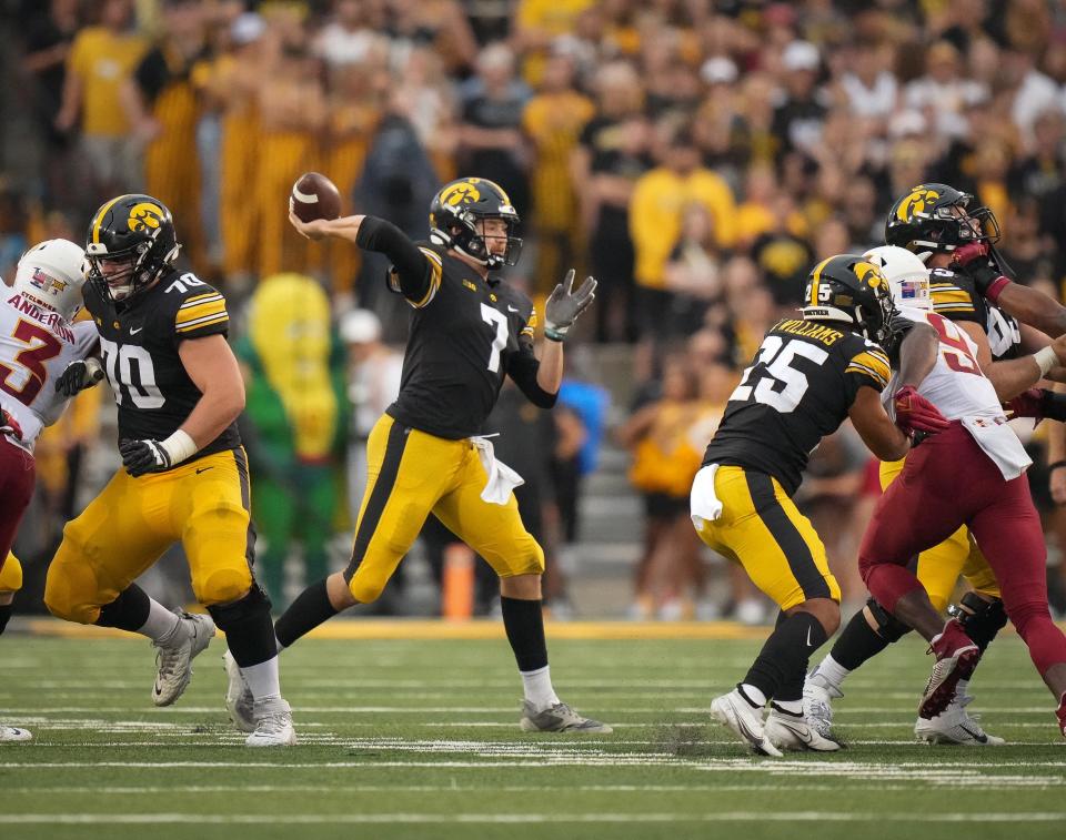 Iowa quarterback Spencer Petras fires a pass during the Cy-Hawk Series football game against Iowa State on Saturday, Sept. 10, 2022, at Kinnick Stadium in Iowa City.