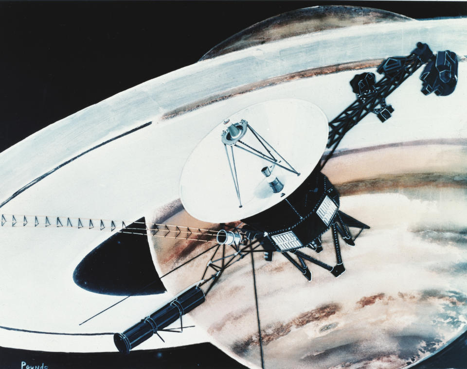 Illustration (by Pounds) shows one of the two Voyager spacecrafts as it examines the rings of Saturn during its 'Grand Tour' of the Solar System, late 1977. The two crafts were launched in late 1977 and reached Saturn in 1980 and 1980. (Photo by Katherine Young/Getty Images)