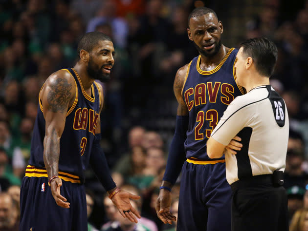 Cleveland Cavaliers All-Star guard Kyrie Irving, right, talks with