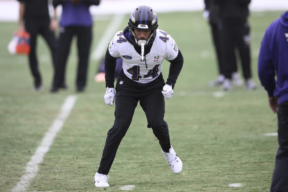 Baltimore Ravens cornerback Marlon Humphrey (44) runs a drill during an NFL football practice, Thursday, Jan. 25, 2024, in Owings Mills, Md. (AP Photo/Nick Wass)