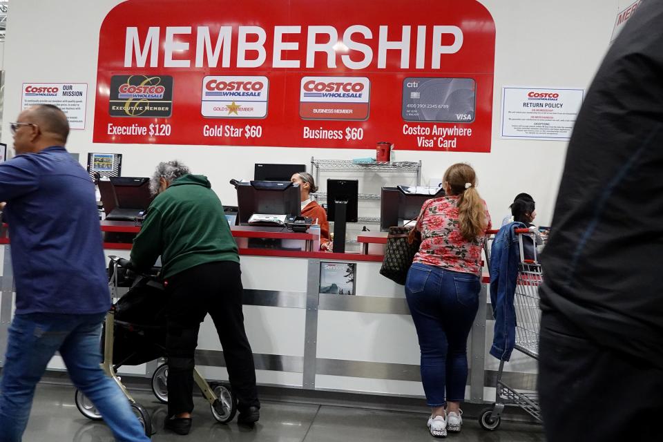 Customers visit a Costco Wholesale store on Dec. 15, 2023 in Miami.