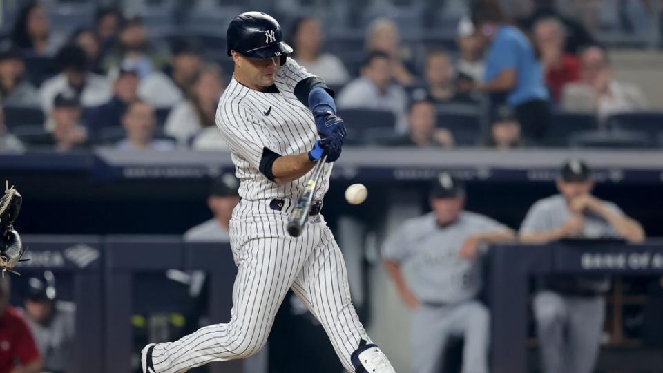 June 6, 2023;  Bronx, New York, USA;  New York Yankees center fielder Isiah Kiner-Falefa (12) hits an RBI double against the Chicago White Sox during the seventh inning at Yankee Stadium.