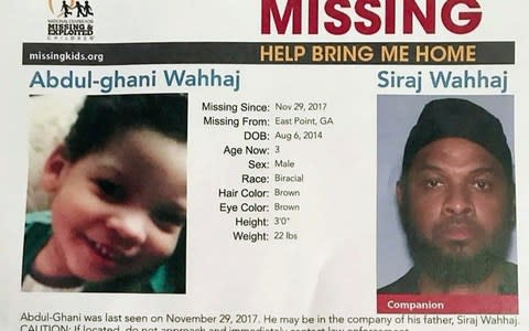 A poster from the National Center for Missing & Exploited Children shows Abdul-ghani Wahhaj, left, and his father Siraj Wahhaj - Credit:  National Center for Missing & Exploited Children