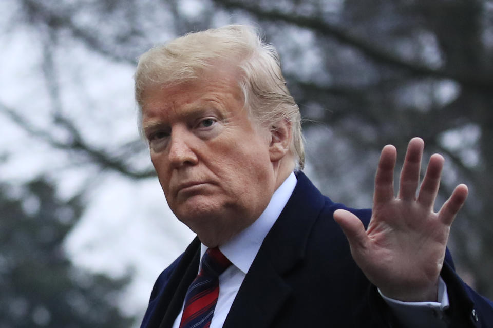 President Donald Trump walks on the South Lawn upon arrival at the White House in Washington, Saturday, Jan. 19, 2019, after attending the casualty return at Dover Air Force Base, Del., for the four Americans killed in a suicide bomb attack in Syria. (AP Photo/Manuel Balce Ceneta)