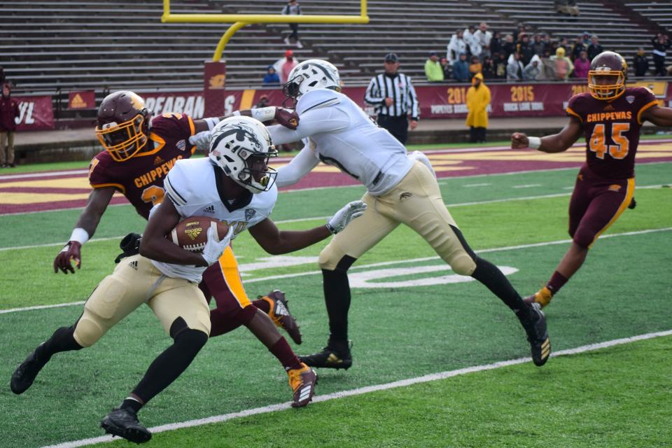 Western Michigan's Jayden Reed (87) returns a punt against Central Michigan's Sean Bunting during an NCAA college football game, Saturday, Oct. 20, 2018, in Mount Pleasant, Mich.