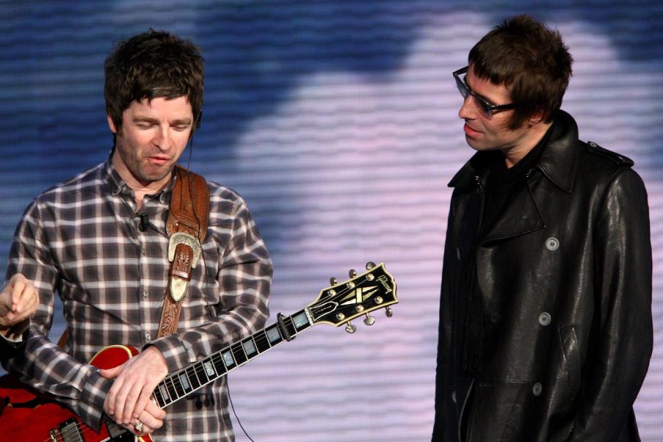 Noel and Liam Gallagher on stage together in 2008 (Getty Images)