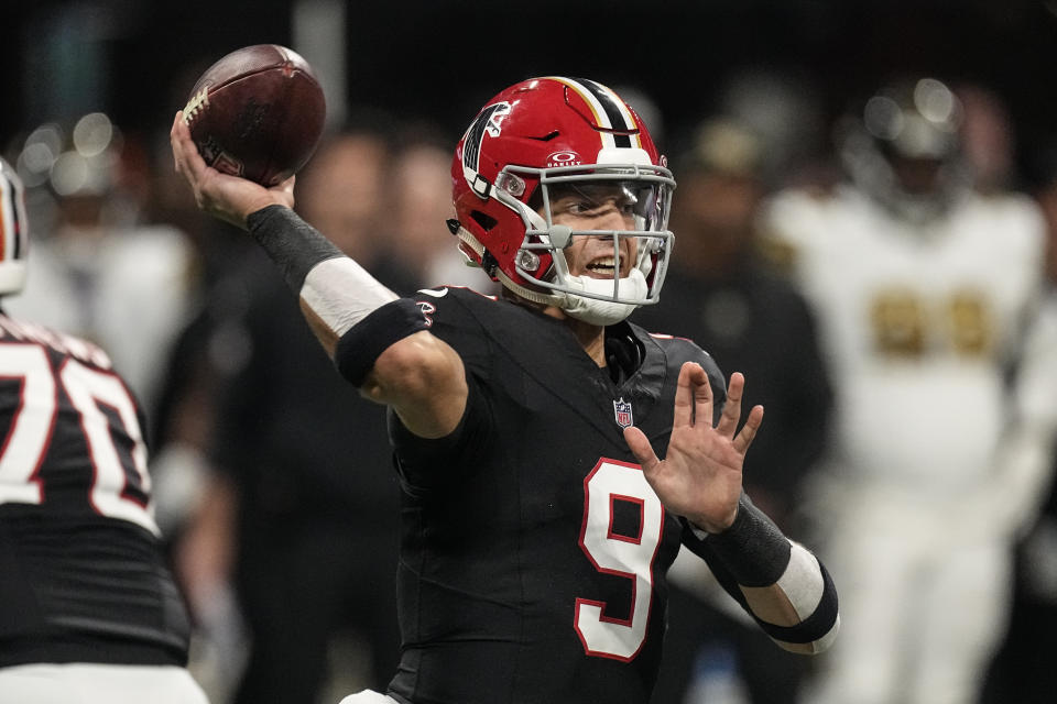 Atlanta Falcons quarterback Desmond Ridder (9) works in the pocket against the New Orleans Saints during the first half of an NFL football game, Sunday, Nov. 26, 2023, in Atlanta. (AP Photo/John Bazemore)