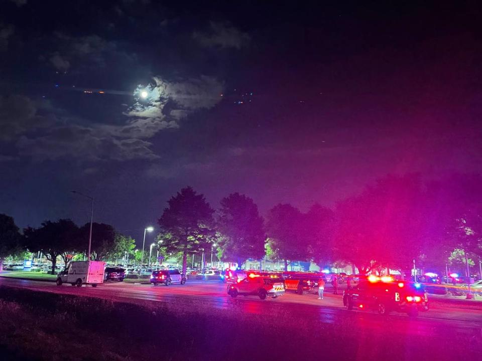 Arlington police say a gunman was wounded by officers and is in custody after opening fire at the Vandergriff Honda dealership on the I-20 service road on Thursday night, Sept. 28, 2023.