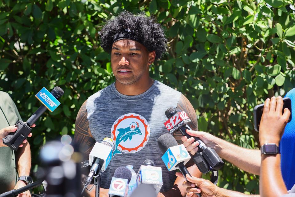 Jun 4, 2024; Miami Gardens, FL, USA; Miami Dolphins quarterback Tua Tagovailoa (1) speaks to reporters during mandatory minicamp at Baptist Health Training Complex. Mandatory Credit: Sam Navarro-USA TODAY Sports