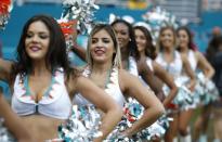 <p>Miami Dolphins cheerleaders perform during the first half of an NFL football game against the Pittsburgh Steelers, Sunday, Oct. 16, 2016, in Miami Gardens, Fla. (AP Photo/Wilfredo Lee) </p>