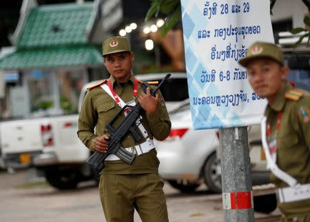 Police stand guard on a street ahead of the Asean Summit in Vientiane, Laos September 5, 2016. REUTERS/Soe Zeya Tun