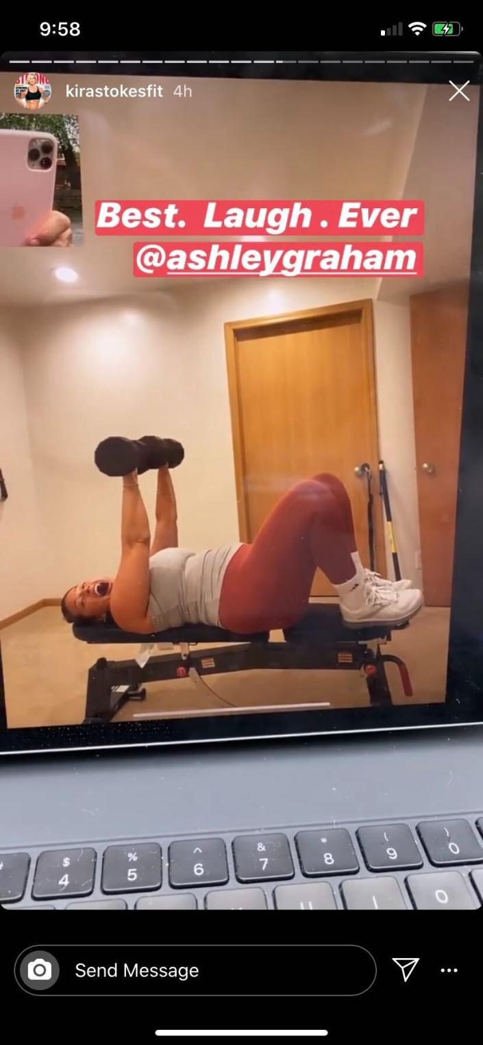 Ashley Graham, red leggings, tank top, lifting weights, workout, white sneakers, adidas socks