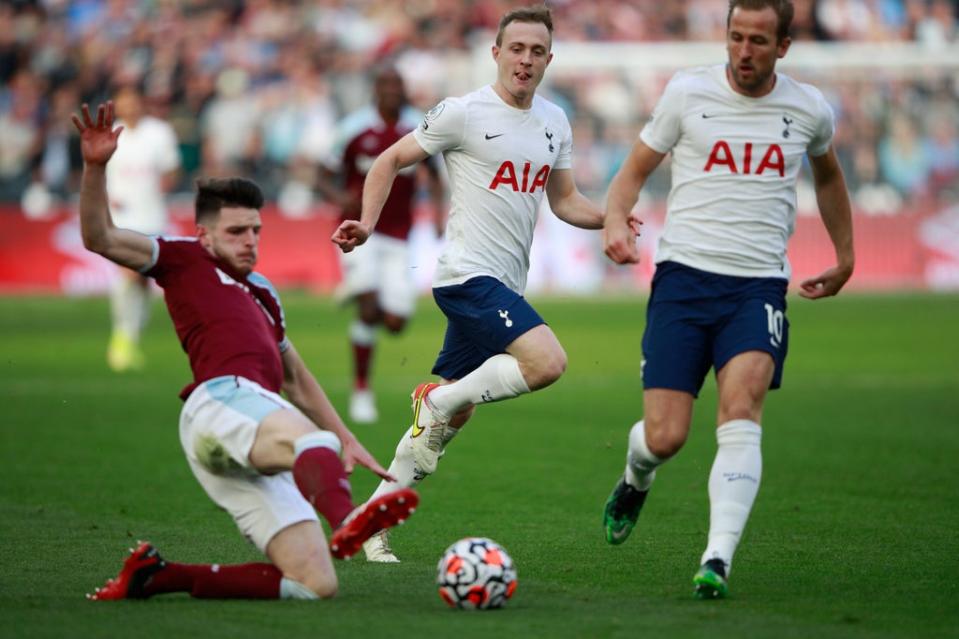 Oliver Skipp (centre) could join Declan Rice and team-mate Harry Kane in the England squad (AP)