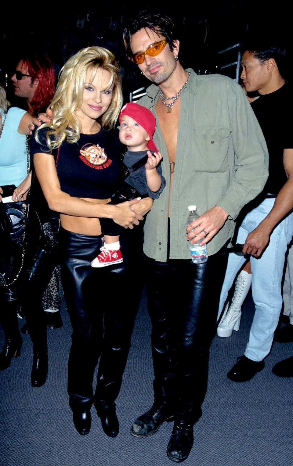 Pamela Anderson, Tommy Lee, and their son Brandon at the Guitar Centre in Hollywood in 1997. Source: Getty