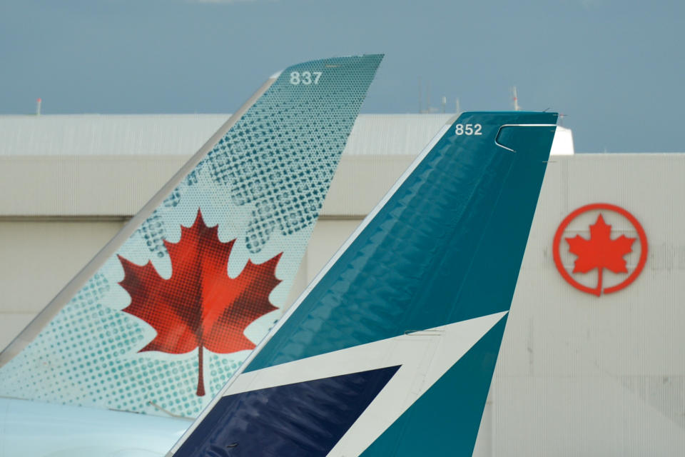 A view of Air Canada and WestJet planes at Calgary International Airport.
On Monday, September 10th, 2018, in Calgary, Alberta, Canada. (Photo by Artur Widak/NurPhoto via Getty Images)