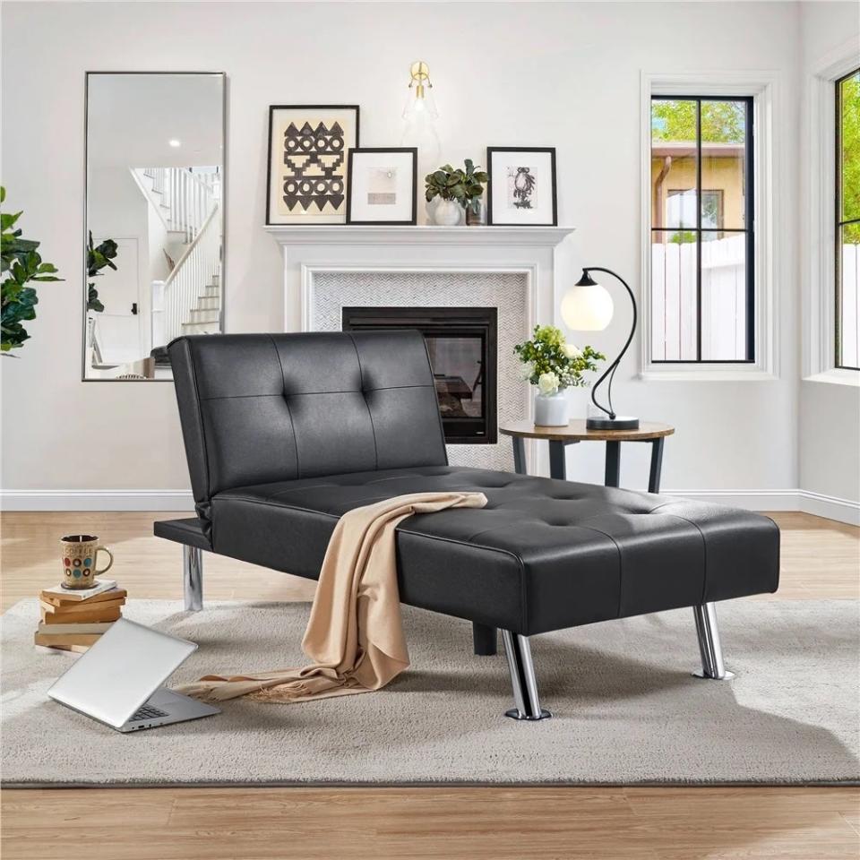 Latitude Run Crisma chaise in black vegan leather in a contemporary living room. 