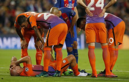 Football Soccer - FC Barcelona v Manchester City - UEFA Champions League Group Stage - Group C - The Nou Camp, Barcelona, Spain - 19/10/16 Manchester City's Pablo Zabaleta lies injured before being substituted Reuters / Albert Gea Livepic EDITORIAL USE ONLY.