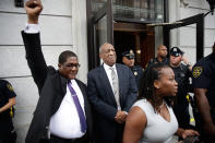 <p>Andrew Wyatt raises his fist as Bill Cosby exits the Montgomery County Courthouse after a mistrial was declared in Norristown, Pa., Saturday, June 17, 2017. Cosby’s trial ended without a verdict after jurors failed to reach a unanimous decision. (AP Photo/Matt Rourke) </p>